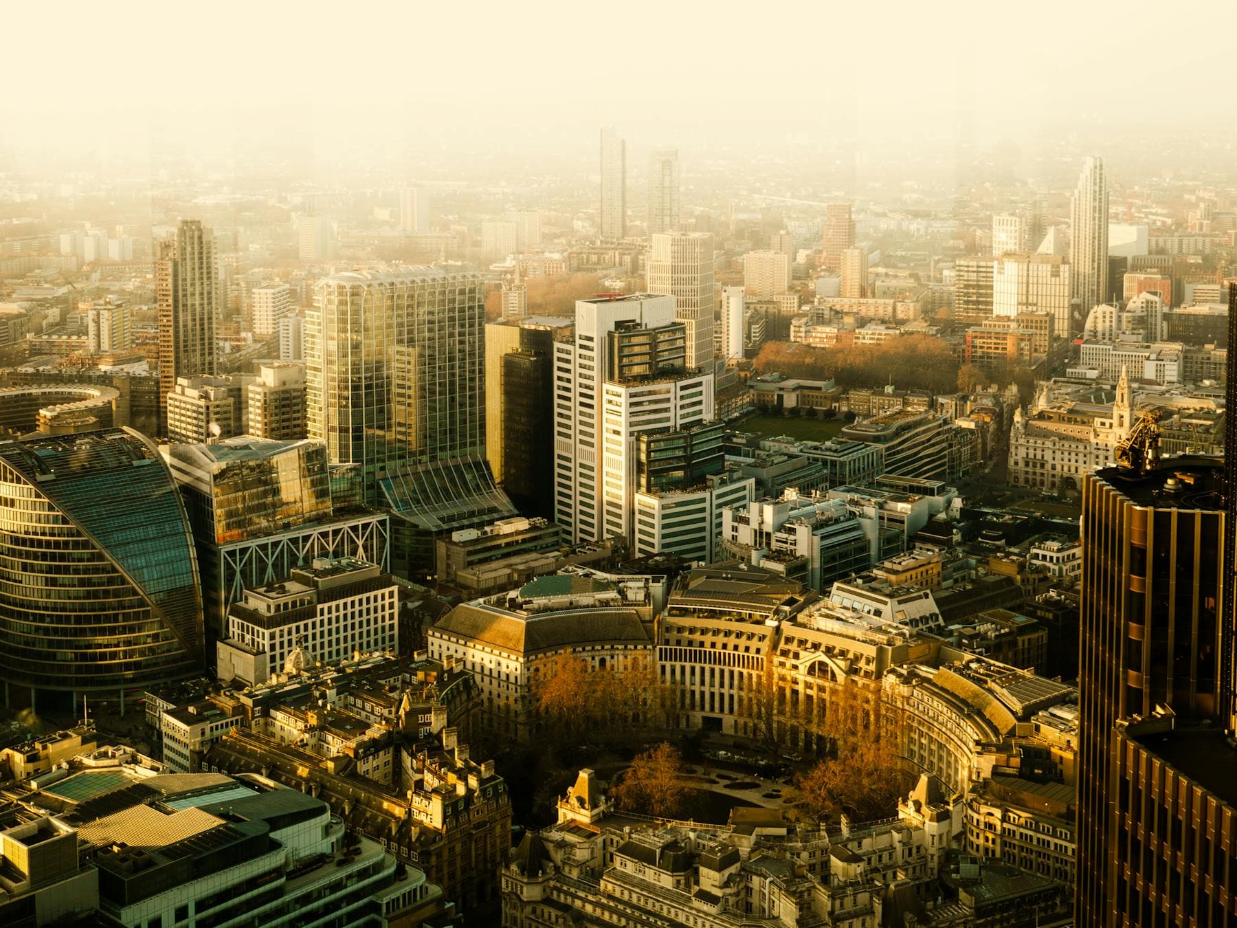 Aerial view of central London commercial buildings at golden hour, Commercial EPC in Mayfair