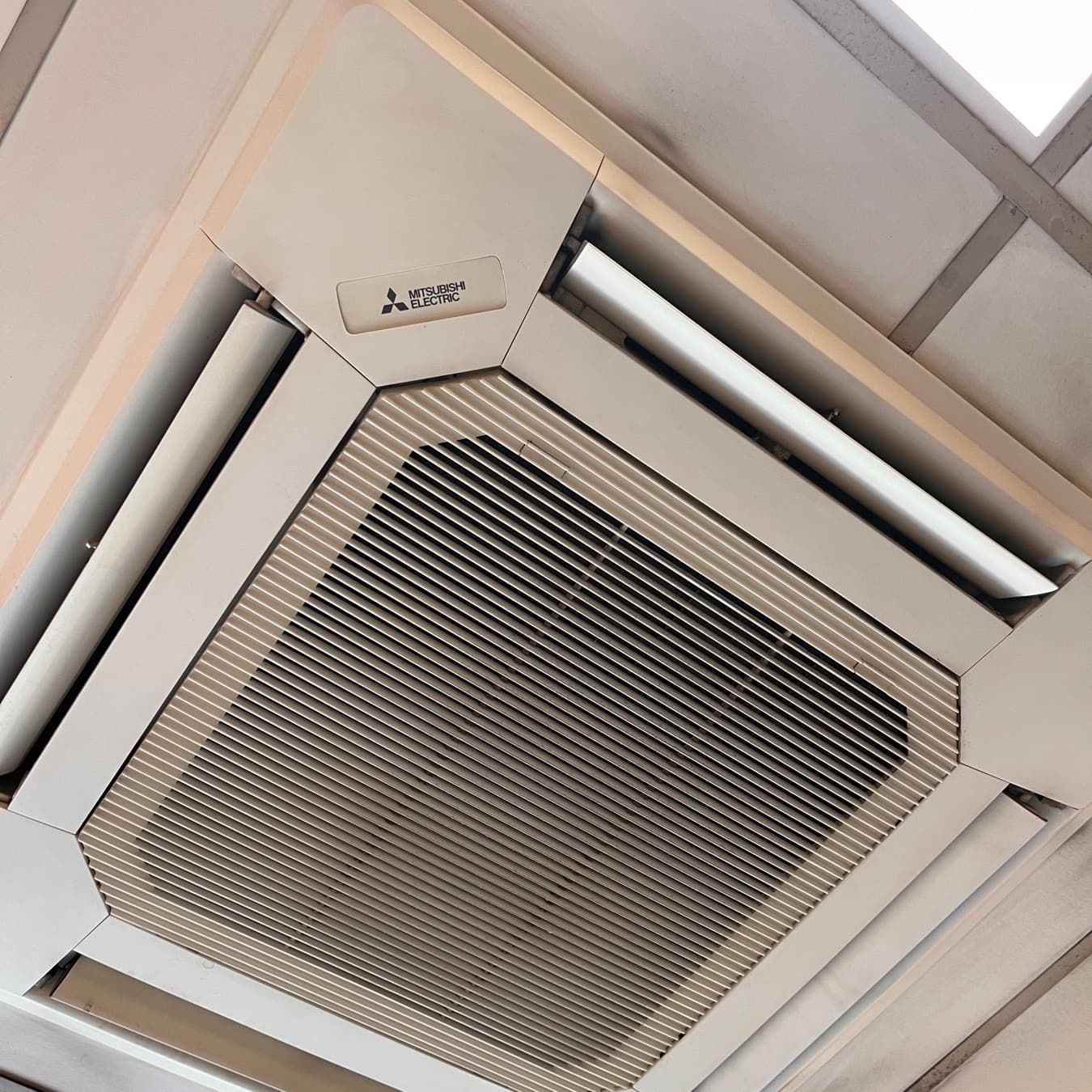 Mitsubishi Electric four-way ceiling cassette unit in suspended ceiling